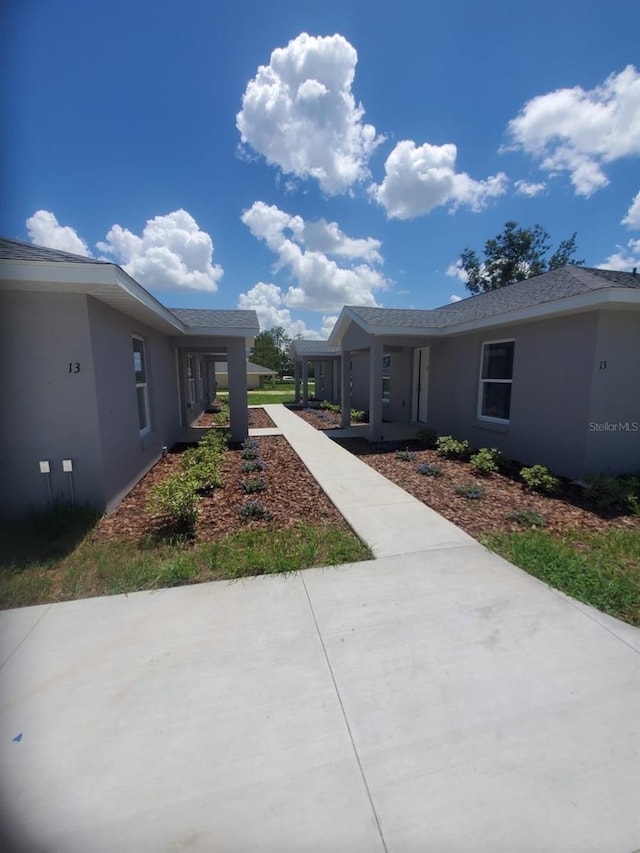 exterior space featuring stucco siding