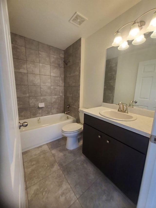 bathroom with shower / bathtub combination, tile patterned flooring, toilet, vanity, and visible vents