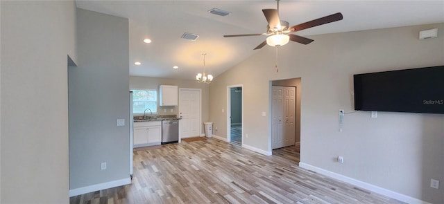 kitchen with a sink, visible vents, white cabinets, and stainless steel dishwasher