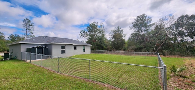 view of yard with a fenced backyard and cooling unit