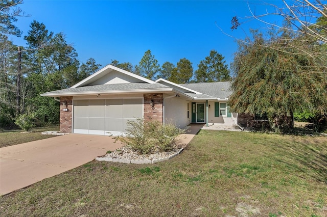 single story home featuring a garage, a shingled roof, concrete driveway, a front yard, and brick siding