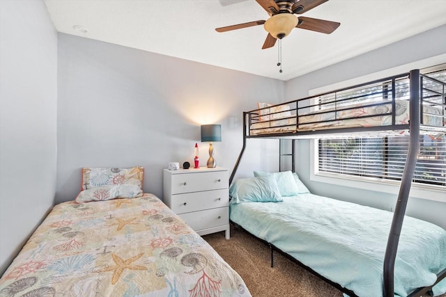 carpeted bedroom with a ceiling fan