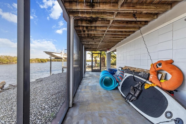 view of patio featuring a water view