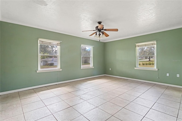 unfurnished room with baseboards, ornamental molding, ceiling fan, and a wealth of natural light