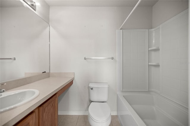 bathroom with bathing tub / shower combination, toilet, vanity, tile patterned flooring, and baseboards