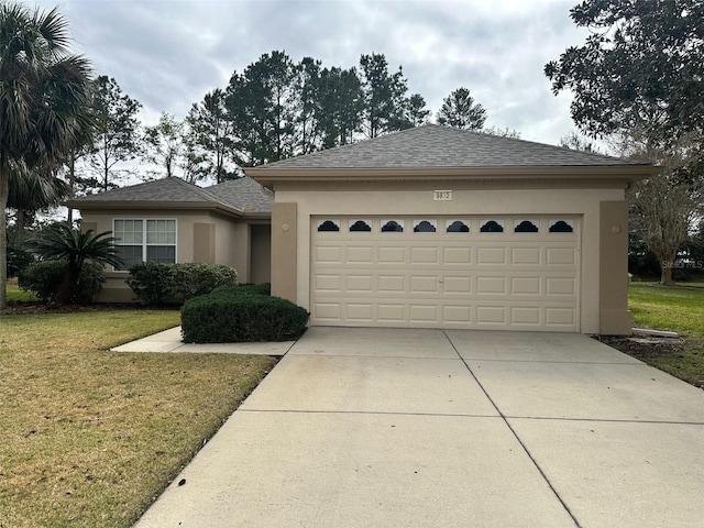 view of front of property with an attached garage, a shingled roof, concrete driveway, stucco siding, and a front yard