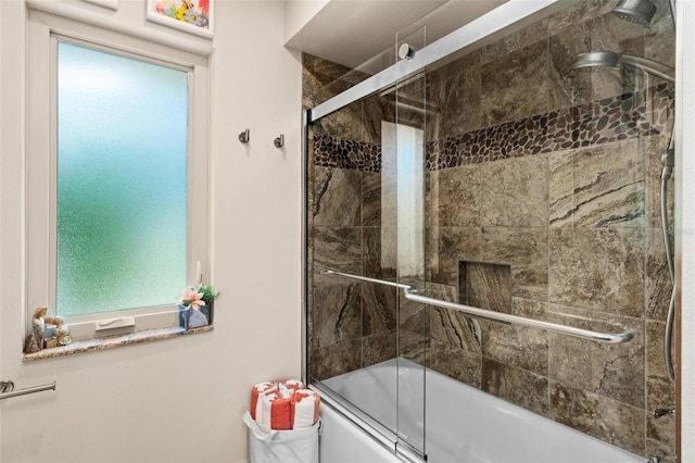 bathroom with enclosed tub / shower combo