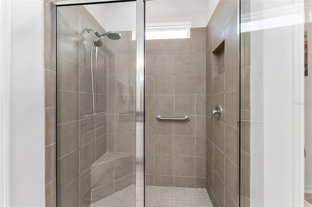 bathroom featuring a stall shower