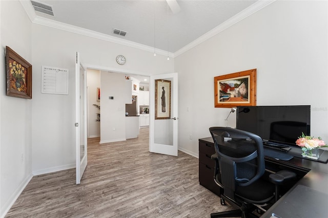 office area with visible vents, wood finished floors, and ornamental molding