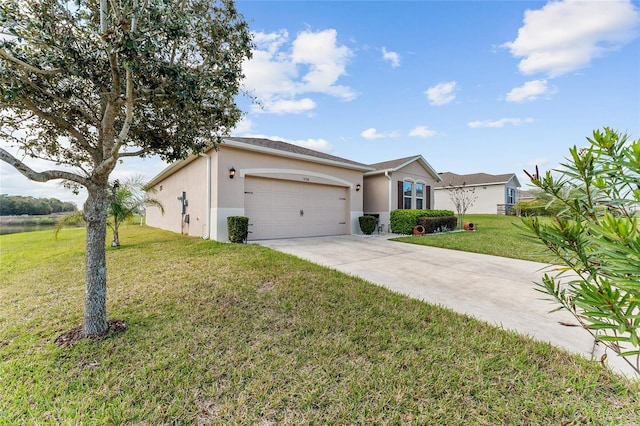 ranch-style home featuring a garage, a front yard, driveway, and stucco siding