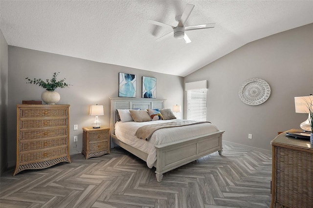 bedroom featuring lofted ceiling, baseboards, a ceiling fan, and a textured ceiling