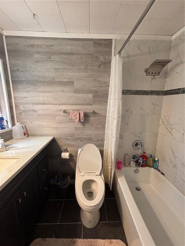 bathroom with tile patterned floors, toilet, shower / bath combo, and vanity