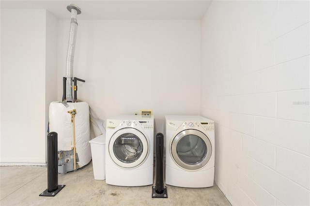 8669 SW 88th Loop, Ocala, FL 34481 - washroom with water heater, independent washer and dryer, and concrete block wall