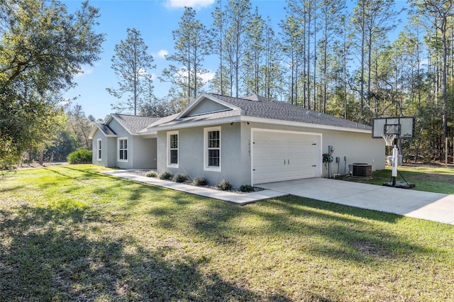 view of property exterior featuring an attached garage, cooling unit, concrete driveway, a lawn, and stucco siding