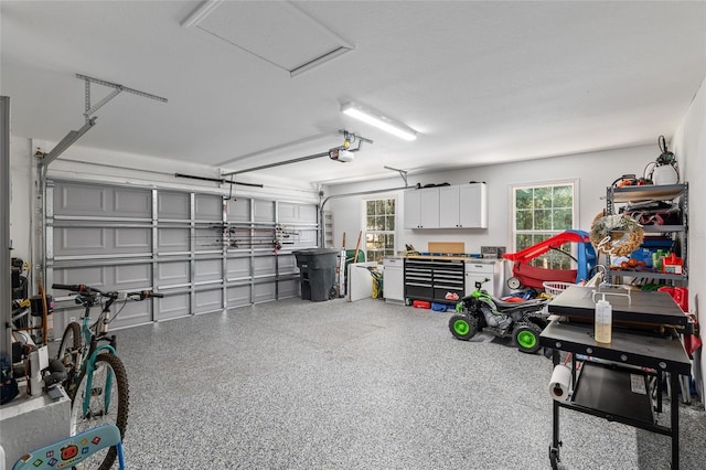 garage featuring a garage door opener