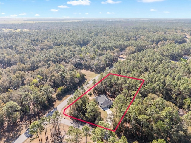 aerial view featuring a forest view