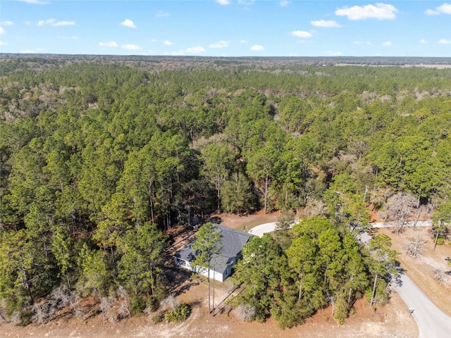 drone / aerial view with a forest view