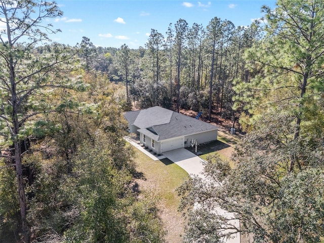 bird's eye view with a forest view