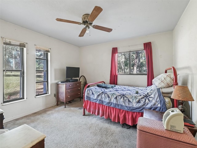 bedroom featuring a ceiling fan and carpet flooring