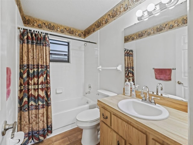 bathroom featuring vanity, wood finished floors, toilet, and shower / tub combo with curtain