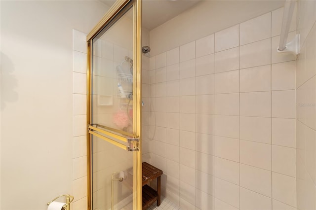 full bathroom with tiled shower