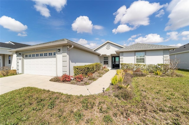 ranch-style house featuring concrete driveway, an attached garage, and stucco siding