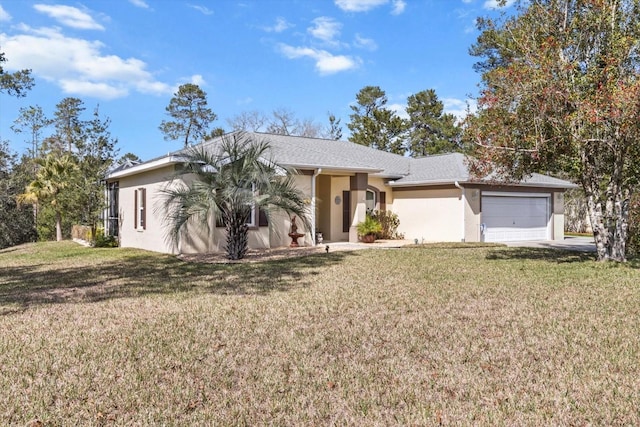 ranch-style house with a garage, a front yard, driveway, and stucco siding