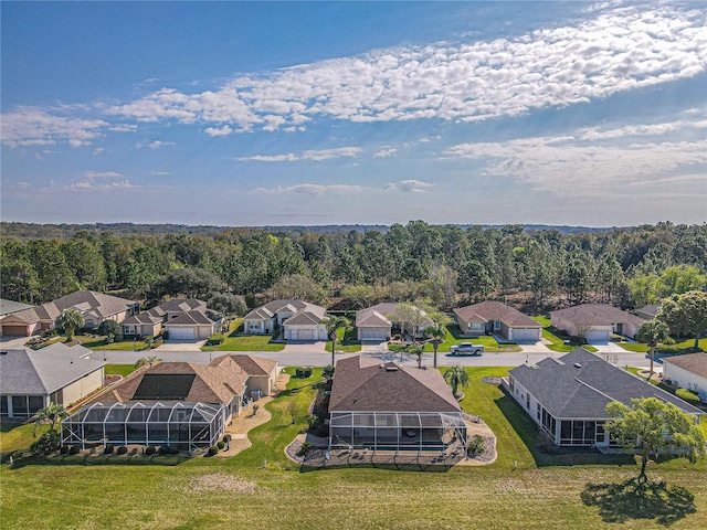 aerial view with a forest view and a residential view