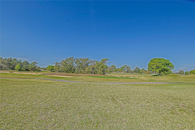 view of home's community featuring a yard