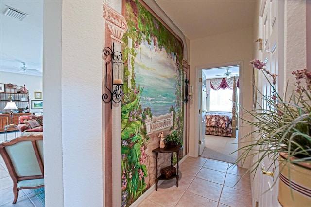 interior space with tile patterned flooring and visible vents