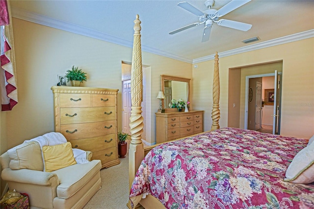 carpeted bedroom with ornamental molding, visible vents, and a ceiling fan