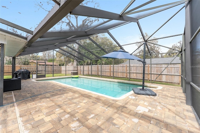 view of pool featuring a patio, a fenced backyard, a lanai, and a fenced in pool