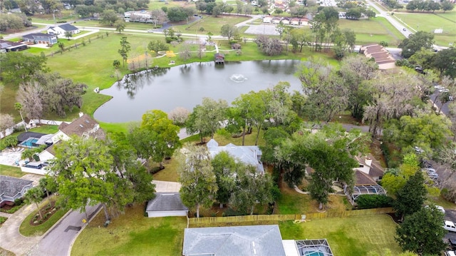 bird's eye view featuring a residential view and a water view