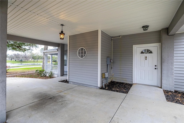 doorway to property with a porch