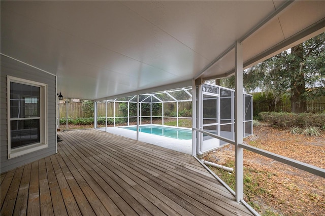 pool with glass enclosure and fence