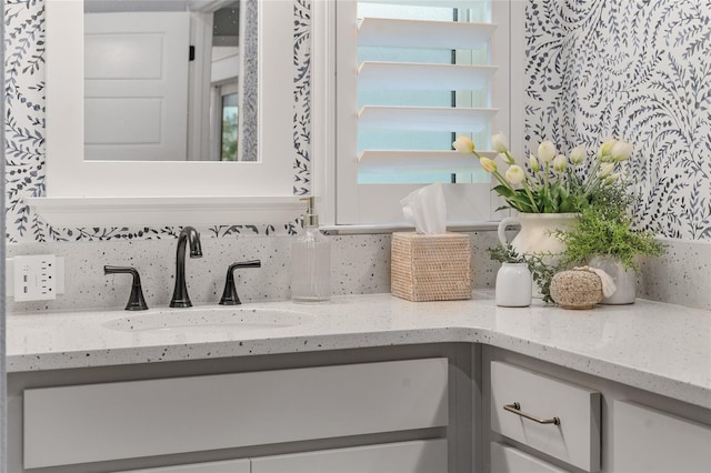 interior details with backsplash and vanity