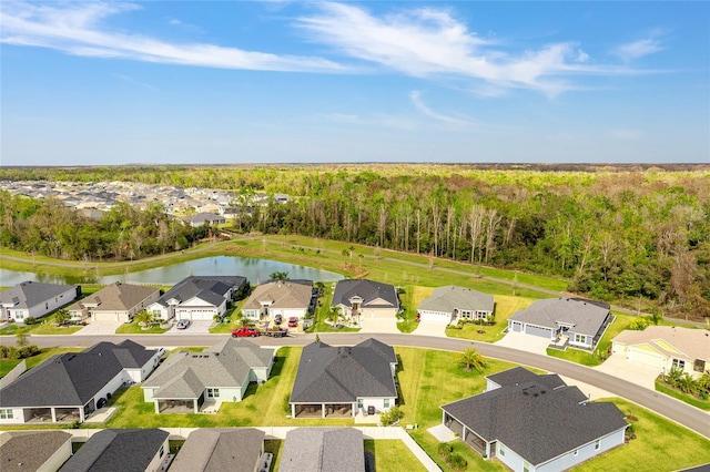 aerial view featuring a residential view and a water view