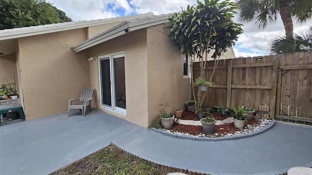 view of patio with fence