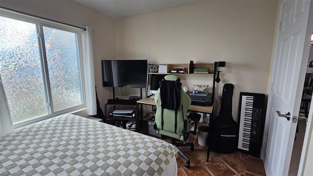 bedroom with multiple windows