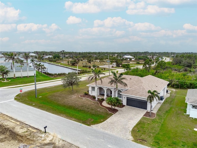 drone / aerial view featuring a water view