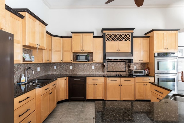 kitchen with ornamental molding, light brown cabinetry, stainless steel appliances, and a sink