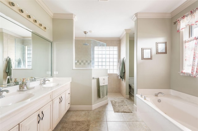 full bath featuring a garden tub, a sink, a walk in shower, and crown molding