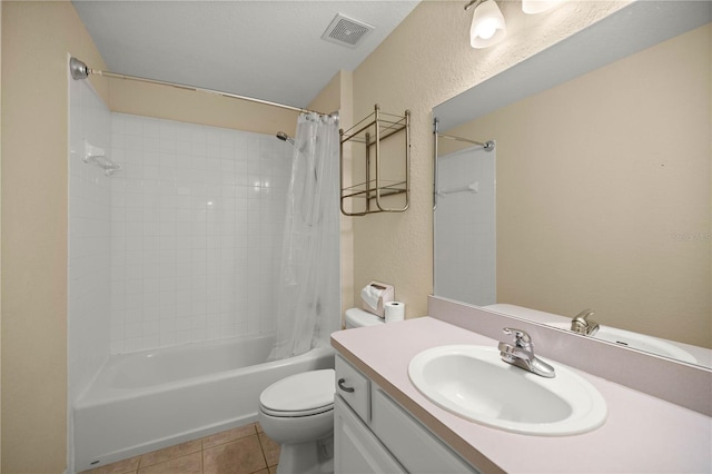 full bathroom featuring shower / bath combination with curtain, visible vents, toilet, vanity, and tile patterned flooring