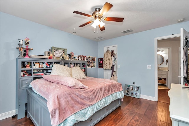 bedroom featuring baseboards, visible vents, ceiling fan, and dark wood-style flooring