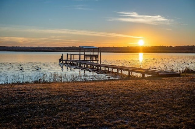 dock area featuring a water view