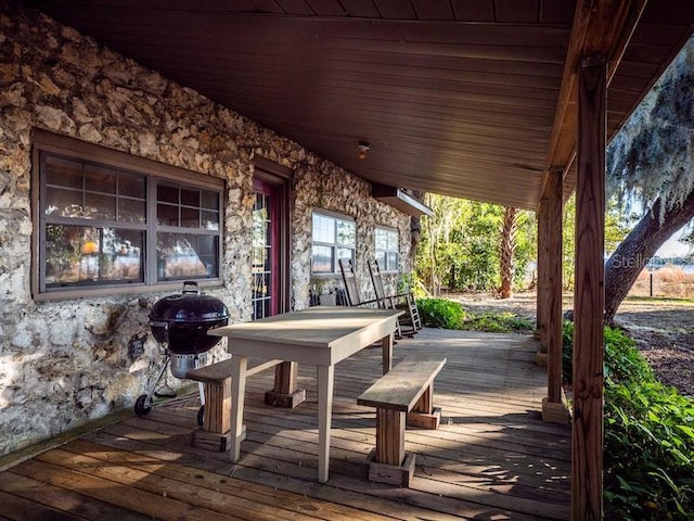 wooden deck with area for grilling