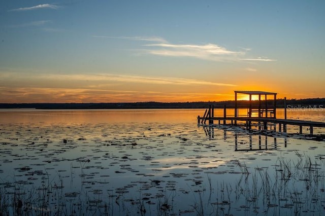 view of dock with a water view