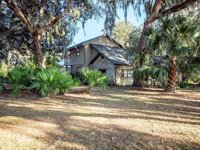 view of home's exterior featuring a lawn