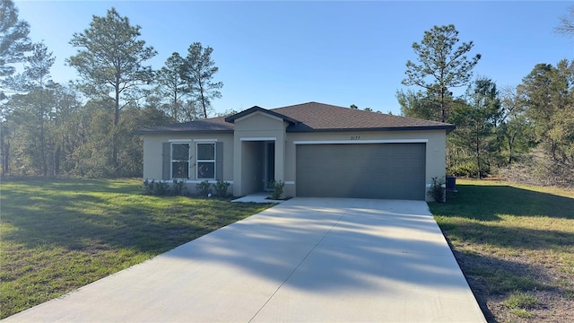 ranch-style home featuring a garage, a front lawn, concrete driveway, and stucco siding