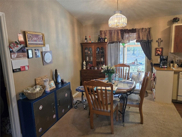 dining space with light carpet